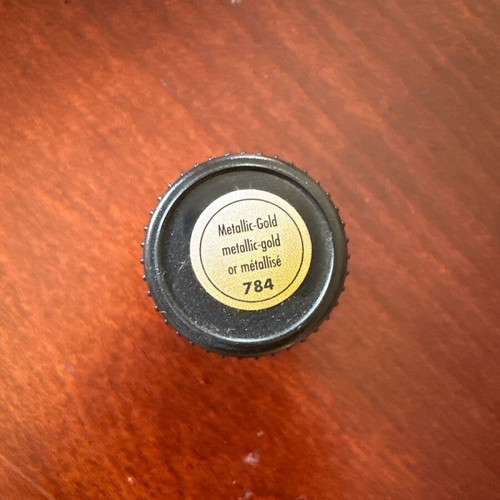 Gold acrylic paint like new