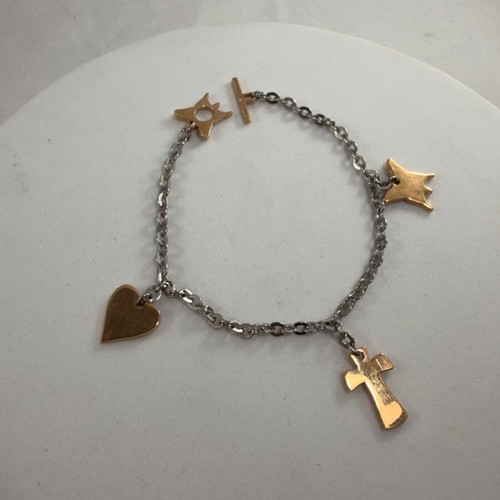 Rebecca bracelet stainless steel like new, gold and silver with designs