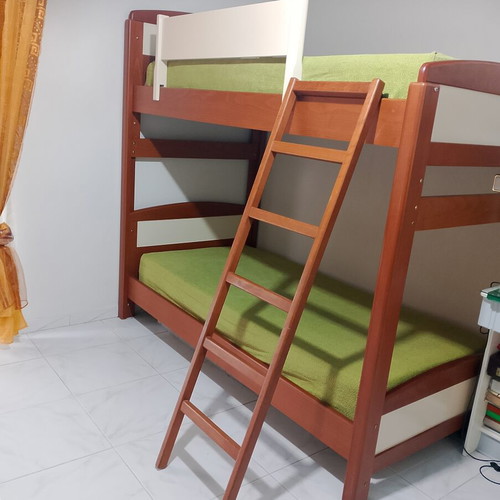 Bunk bed with mattresses used, children's room