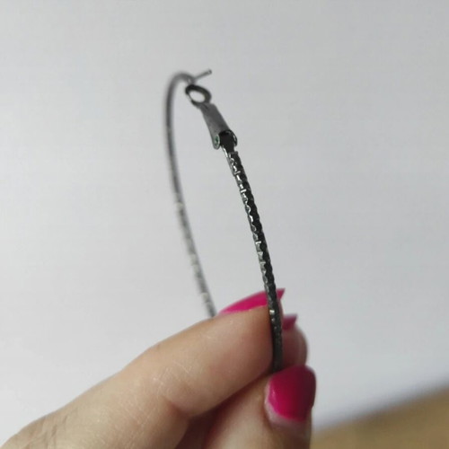 Large hoop earrings set 2 pairs like new, silver and black hammered