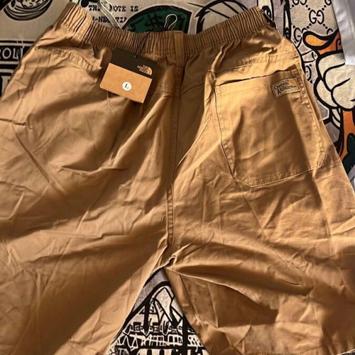 The North Face cargo shorts new with tags, size M, beige