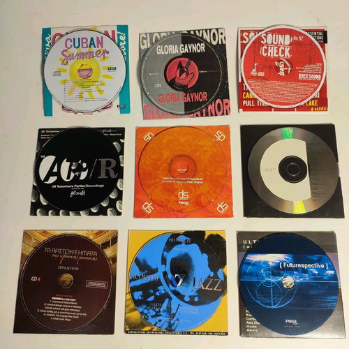 9 music CDs like new, pack with paper case and cover