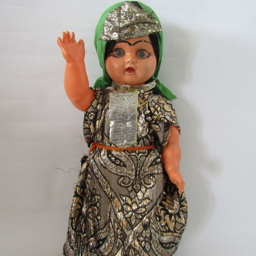 Vintage souvenir doll with traditional oriental costume used
