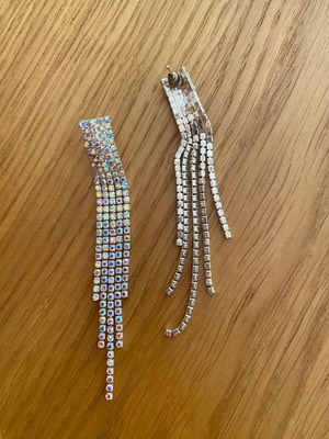 Asymmetric long evening earrings with rhinestones