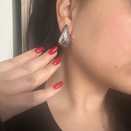 Earrings new, finely carved steel