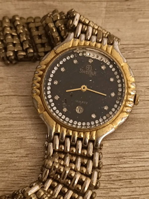 Swistar watch 18k gold plated used with visible signs of wear