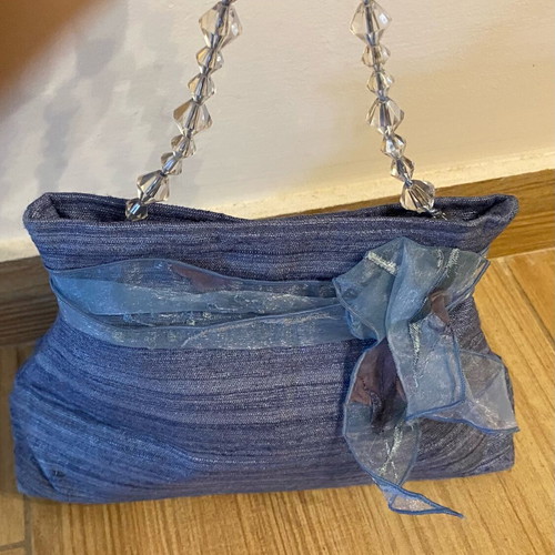 Small blue handbag new with ribbon and transparent beads