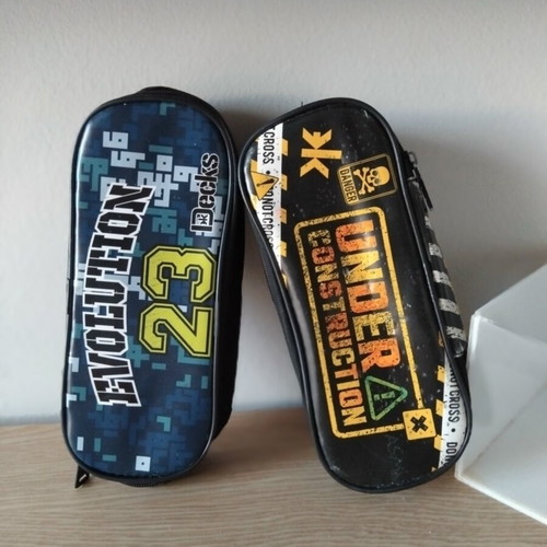 Decks & Under Construction oval pencil cases, set of 2