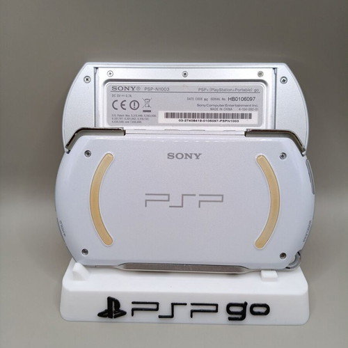 PSP Go white like new, hacked for free games, with charging cable