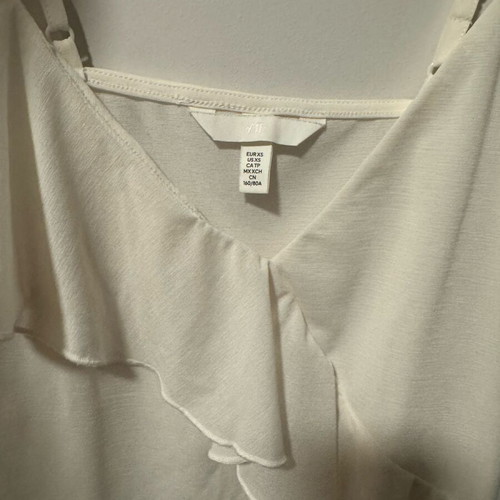 H&M blouse white size small new with impressive neckline