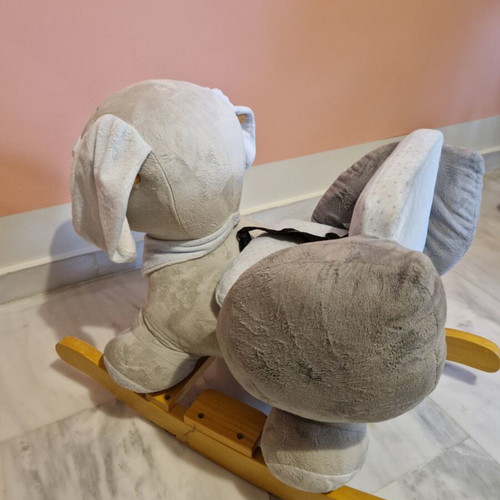 Rocking dog plush toy like new