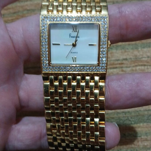 Freelook HA1044G/9 women's watch used, gold color