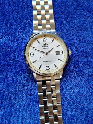Orient Date Automatic ER27-C3-A watch like new, glass back, made in Japan