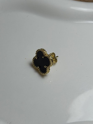Steel earring black and gold, like new, single piece