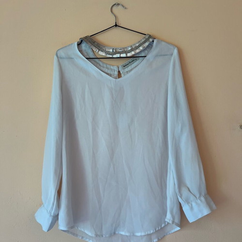 White blouse with silver details around neckline size M like new