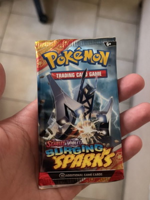 Surging Sparks booster pack sealed