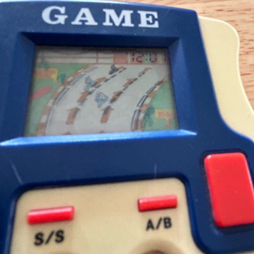Moto racing handheld game used, vintage 80s collectible