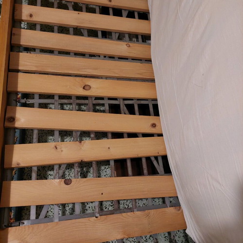 Single solid wood bed used with new mattress