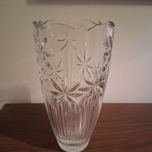 Vintage crystal vase with embossed stars and daisies used