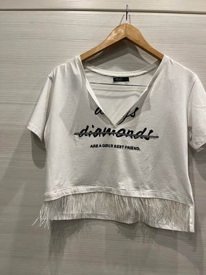 Women's blouse used, white short asymmetric with feathers