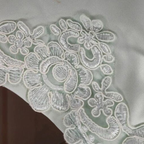 Women's clothing set used, turquoise with lace details