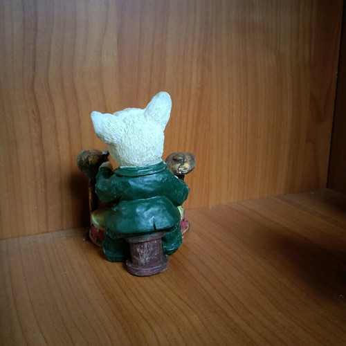 Decorative dog figure with drums like new