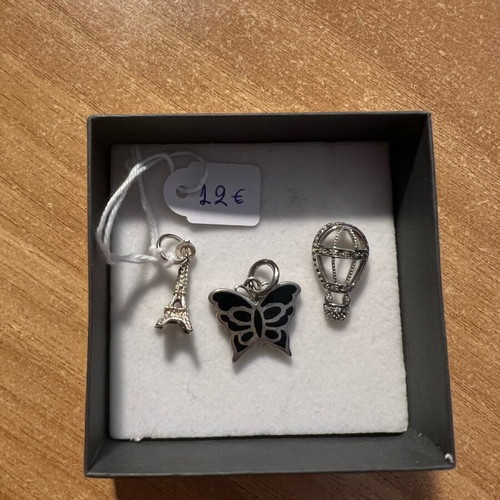 Silver 925 pendants like new, pack with Eiffel tower, butterfly, and hot air balloon