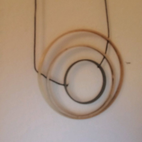 Adjustable necklace used with gold, silver, and dark gray