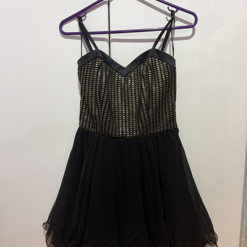 Mini dress black with gold details size S used by Ths Fashion