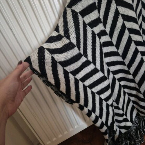 Poncho jacket like new with geometric patterns and fringes