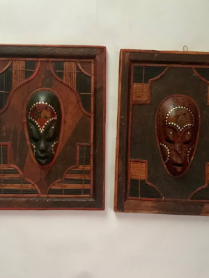 Set of 2 handmade African masks in wooden frames used