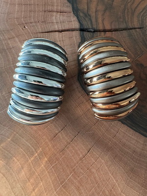 Elastic bracelets like new, set of two in silver and gold with black