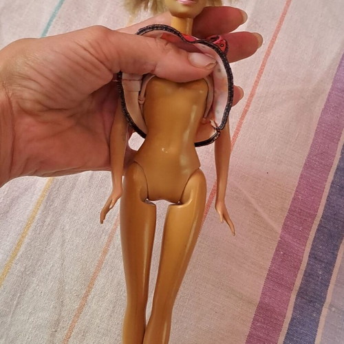 Barbie doll used with modern dress and painted cut hair