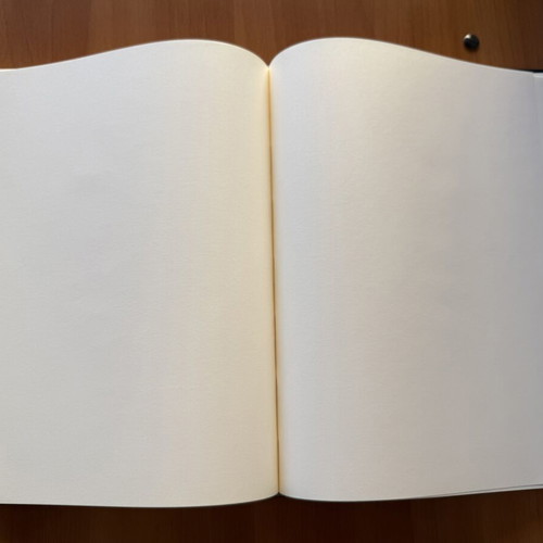 Black sketchbook with fabric cover, 127 sheets