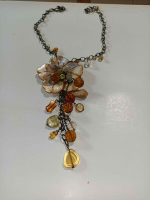Necklace with flower and beads in beige and honey tones, like new