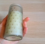 White candle in container new