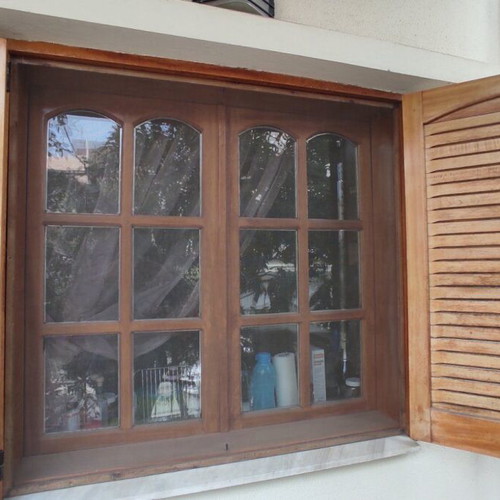 Wooden window frames used, solid mahogany with double glass