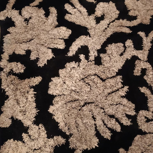 Black and white rug with embossed designs 226x152 cm
