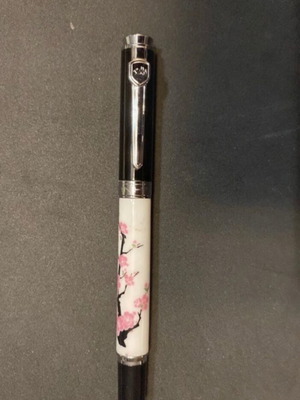 Writing pen with floral design
