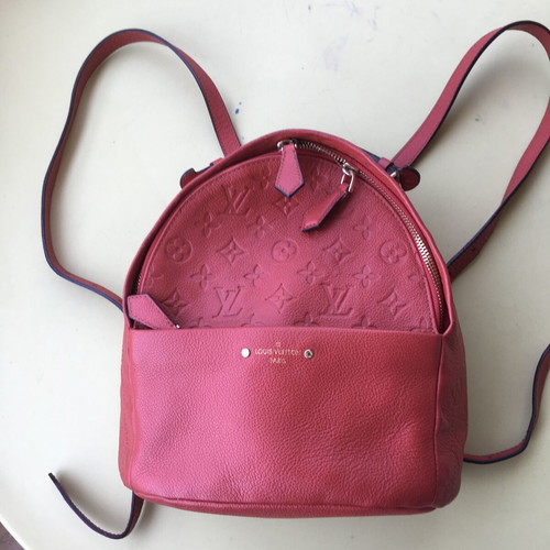 LV backpack small size as new, red