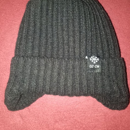 Black hat with ear coverage and fur lining new