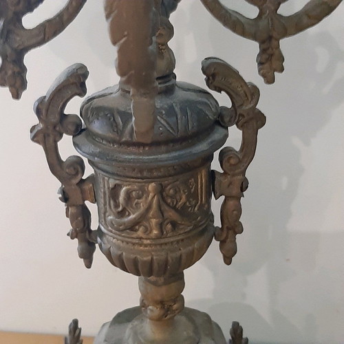 Bronze candlesticks used, pair with patina and carved base