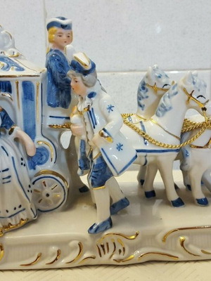 Porcelain carriage with passengers Rococo style used