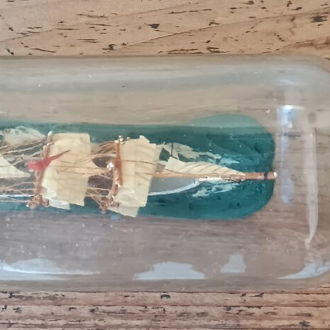 Vintage decorative ship in glass bottle used