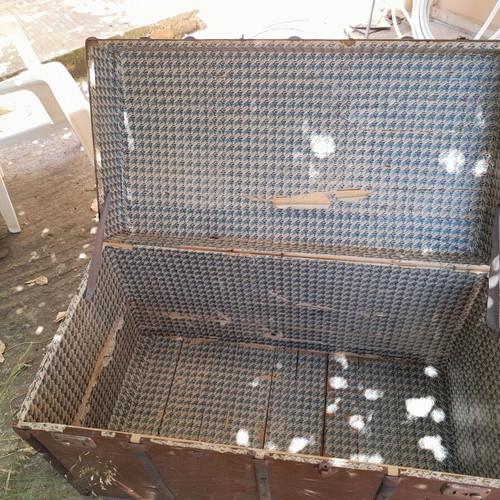 Large antique chest used with iron and wood design