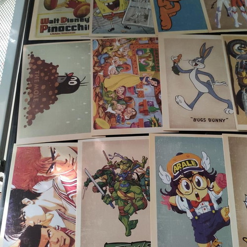 Collectible set of 32 vintage cartoon and anime postcards
