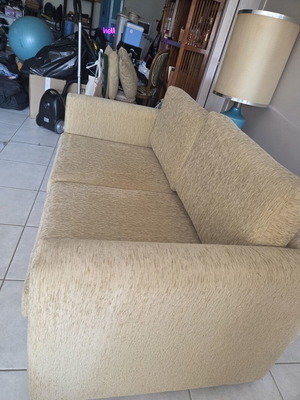 Sofa bed used, beige fabric two-seater