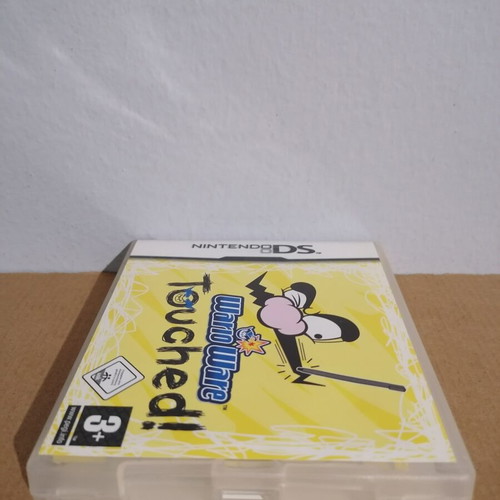 Wario Ware Touched empty case with manuals for Nintendo DS