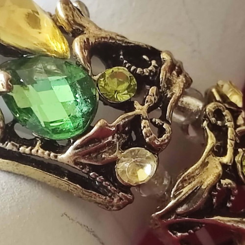 Vintage bracelets with gold finish and multicolored stones