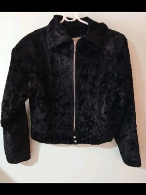 Synthetic fur black like new, size large with narrow fit